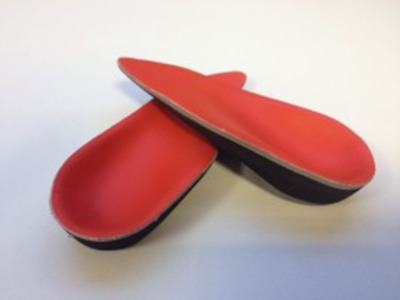 photo pf a pair of custom orthotic insoles