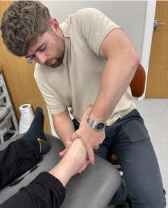 Conor performing Foot & Ankle mobilisations
